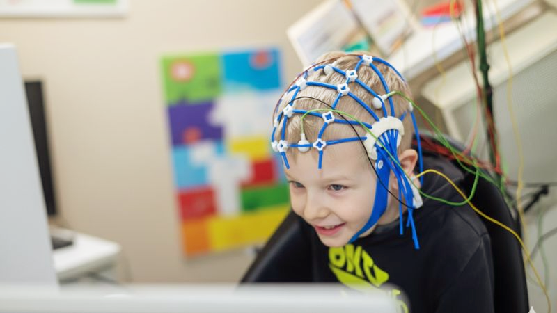 Child participating in brain mapping for ABA therapy at MindWay ABA in Carmel, Indiana, using qEEG technology to measure treatment progress and brain function.