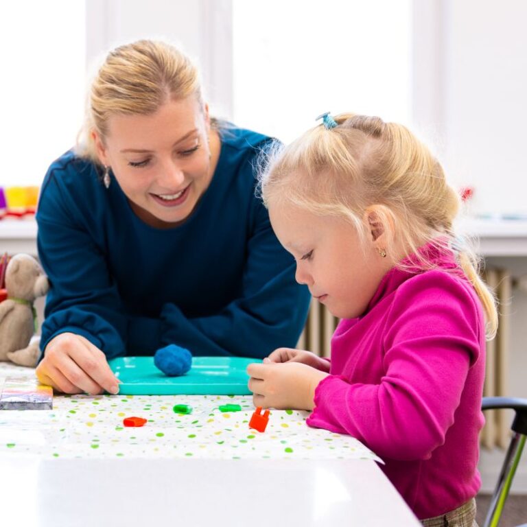A MindWay ABA therapist providing one-on-one support to a child using individualized therapy techniques based on brain mapping insights.