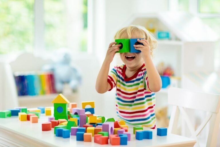 A child playing with blocks during a play-based aba therapy session at MindWay ABA in Carmel.