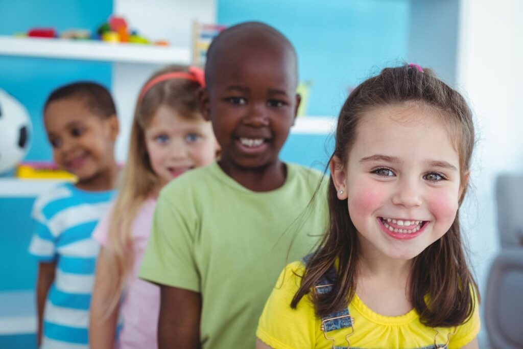 Children at MindWay ABA waiting in line during play-based ABA therapy.